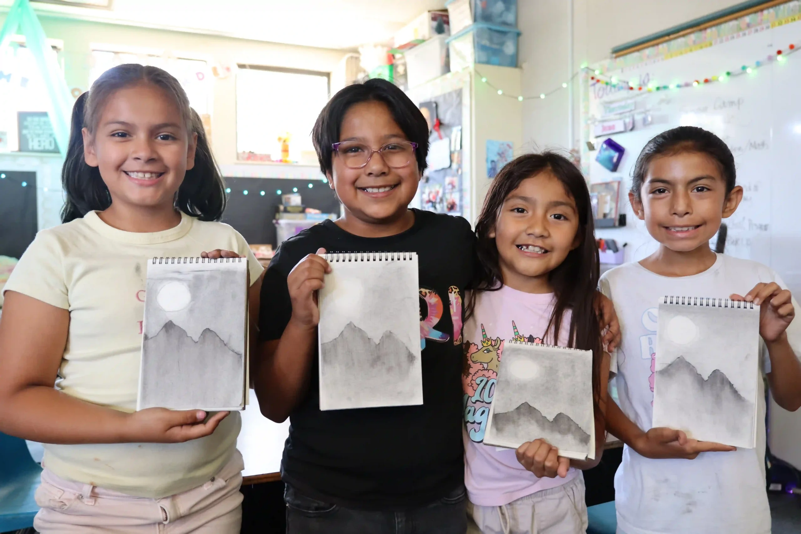 4 Students Showing their Mountain Drawings at UCMA