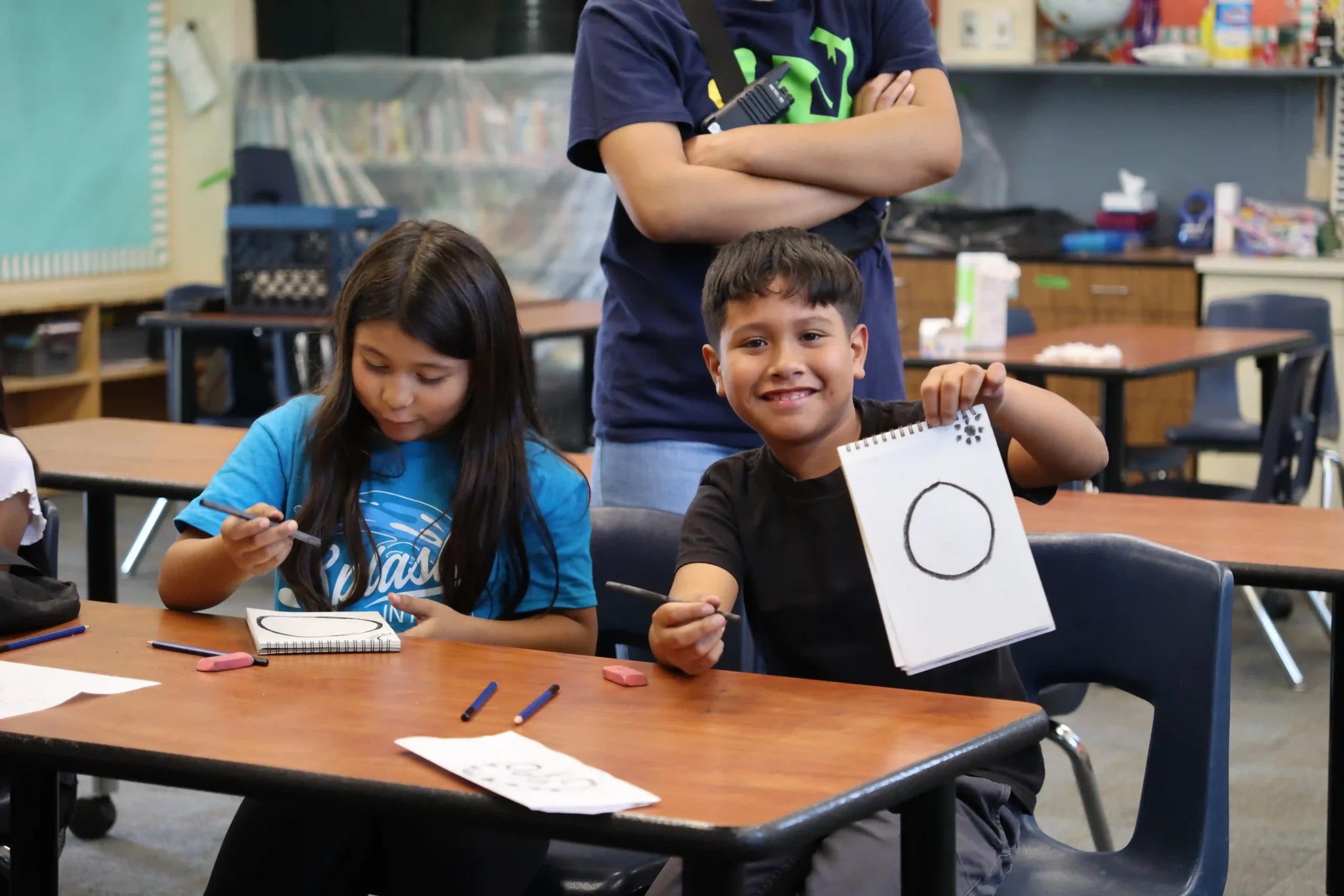 A Student Showing a Circle at UCMA